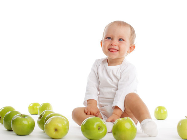 Child with apple isolated on white - Foto, afbeelding