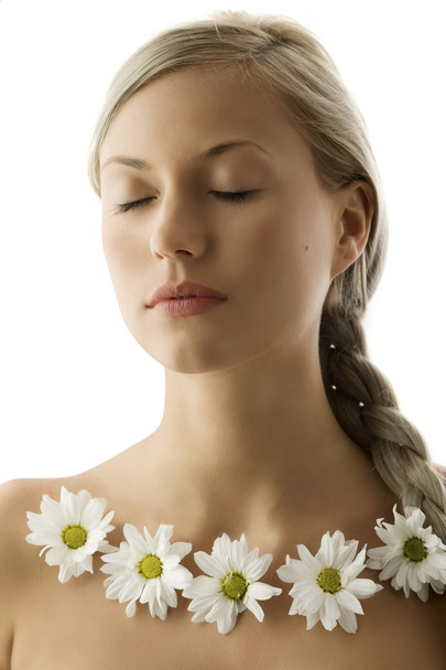 closed eyes portrait of a beautiful woman with twist braid and a flowers necklace - Zdjęcie, obraz