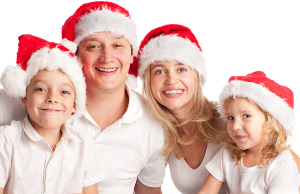 Happiness family in christmas hat isolated on white - Foto, Bild