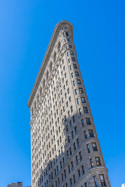 The famous Flatiron building and street view on a spring day in New York City,USA - Zdjęcie, obraz