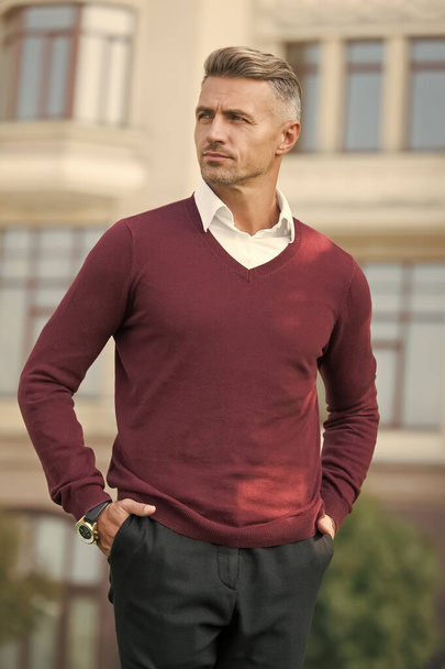look more elegant. Business success. Elegance stays in fashion. well groomed guy outdoor. modern look of sexy man. Fashion model in casual style clothes. Man wearing purple jumper. Long working day - Valokuva, kuva