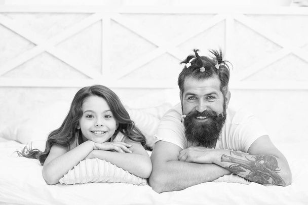 Feeling playful. happy family of teen girl and dad. funny dad having cool hairdo made by child. childrens day. funny leisure time in childhood. relax together. daughter with father smiling - Fotografie, Obrázek