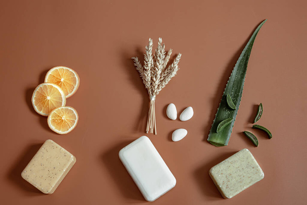 Still life with different types of soap in composition and ingredients. - 写真・画像
