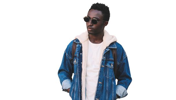 Portrait of stylish young african man model wearing denim jacket isolated on a white background - Foto, immagini