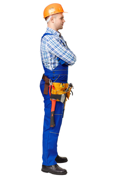 Side view portrait of young male construction worker - Foto, afbeelding