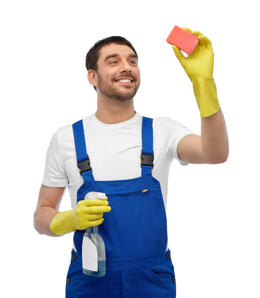 male cleaner cleaning with sponge and detergent - Фото, зображення