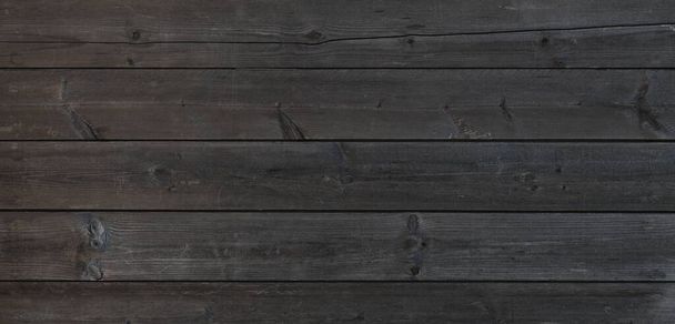 Rustic plank of horizontal pine wood textured with faded dark paint for retro and vintage background design purpose - Foto, Imagem