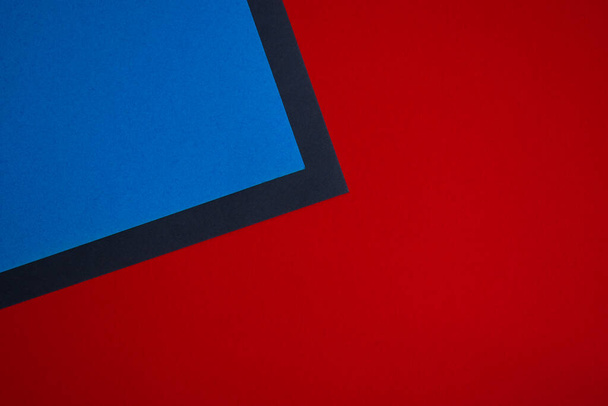 Blue, red and black abstract colored paper background - Photo, Image