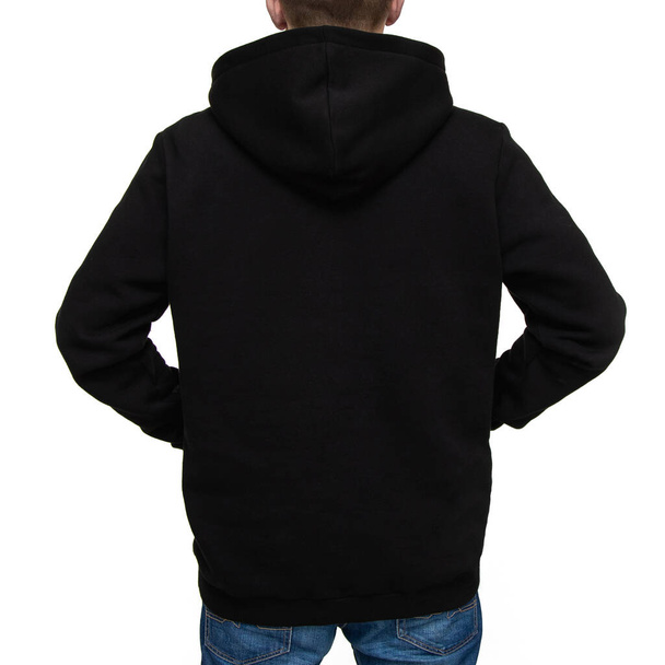 Black hoodie with hood on man isolated on white background, back view. Layout. Mockup for production - Photo, Image