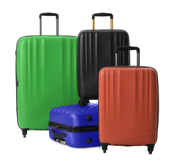 Modern suitcases for travelling on white background - Photo, image