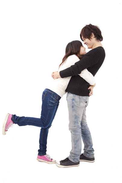 азіатська пара обіймає один одного ізольовано на білому тлі
 - Фото, зображення