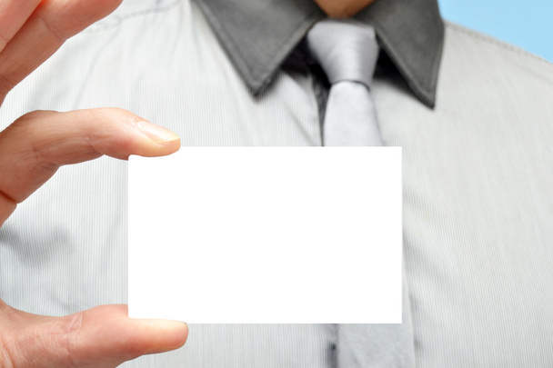 άνθρωπος με μια λευκή κάρτα στο χέρι - Φωτογραφία, εικόνα