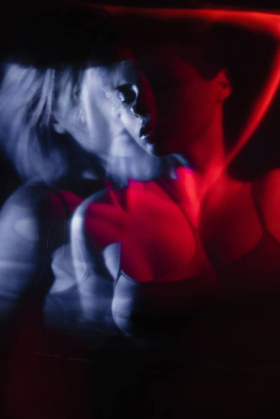soul freedom art portrait blur woman in red light - Valokuva, kuva