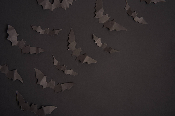 Halloween decoration concept black paper bats black cardboard background With copy space for tetxt  - 写真・画像