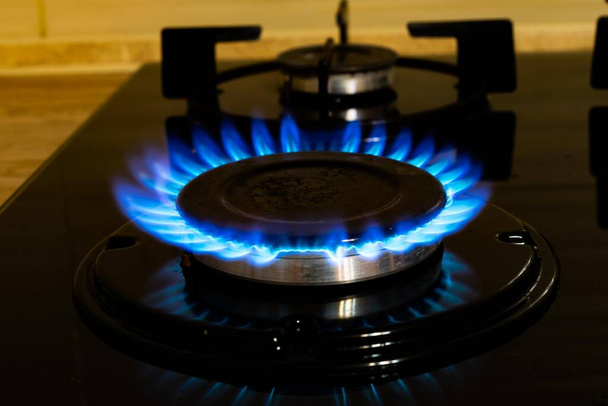 stove gas burner. blue flame. - Photo, Image