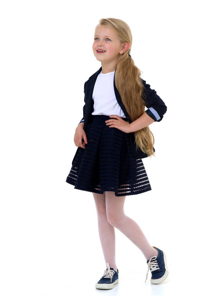 Blonde girl in school uniform. Isolated on white background - Fotografie, Obrázek