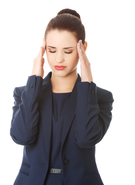 Woman suffering a headache - Foto, afbeelding
