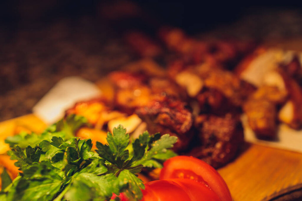 traditional Georgian lula kebab with three types sauce - ketchup, green tkemali, mayonnaise. Selective focused. - 写真・画像