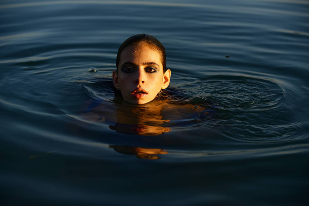 Sexy woman posing in water. Summertime. Sensual girl summer portrait. Beauty female. - Fotoğraf, Görsel