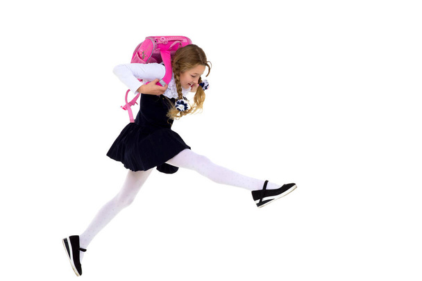 Happy schoolgirl running with backpack - Zdjęcie, obraz