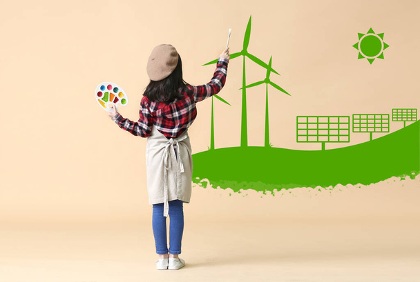 Nettes kleines Mädchen zeichnet Öko-Kraftwerk auf farbigem Hintergrund. Feier zum Weltumwelttag - Foto, Bild