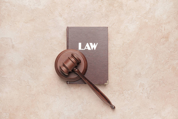 Judge's gavel and law book on color background - Foto, afbeelding