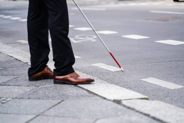 Blind Man Walking With Cane Stick On Road - 写真・画像