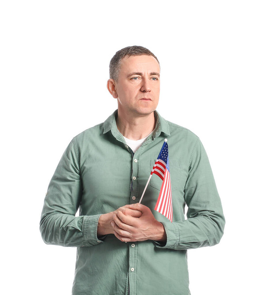 Man with USA flag on white background. Memorial Day celebration - Foto, Imagen