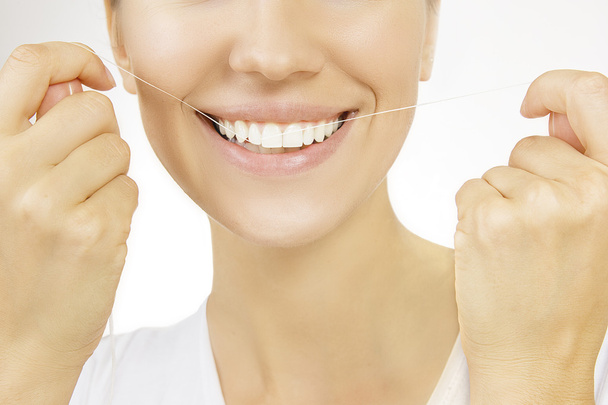 Flossing, Woman and teeth floss - Fotó, kép
