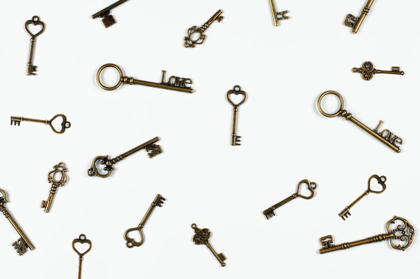 Assorted vintage antique door keys. Lot. On white background. - Photo, Image