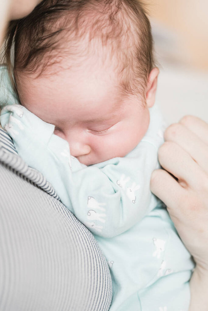 Lifestyle portrait of a newborn, three weeks old baby girl. - Фото, изображение