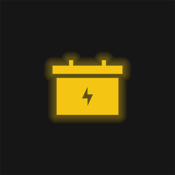 Battery yellow glowing neon icon - Vector, Image