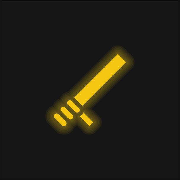 Baton yellow glowing neon icon - Vector, Image