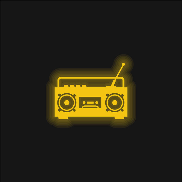 アンテナ付きブームボックスラジオ黄色の輝くネオンアイコン - ベクター画像