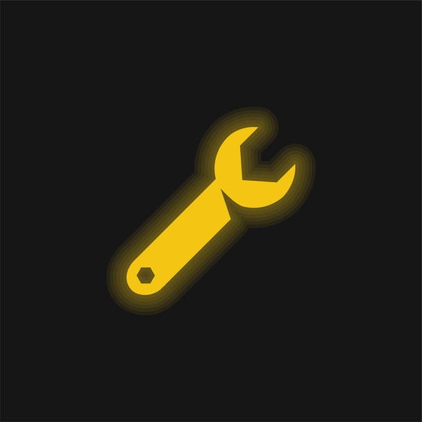Ajustável Spanner amarelo brilhante ícone de néon - Vetor, Imagem