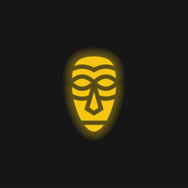 Afrikanische Maske gelb leuchtende Neon-Symbol - Vektor, Bild