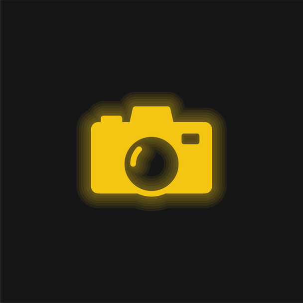大きなカメラの黄色の輝くネオンアイコン - ベクター画像