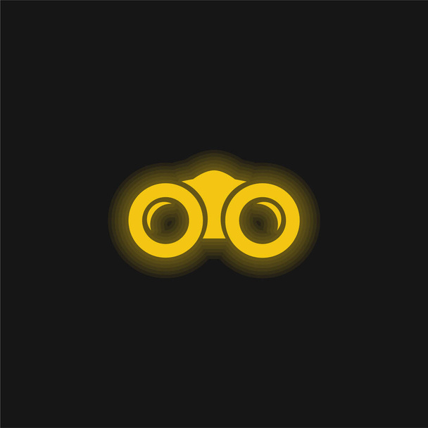 Binóculos amarelo brilhante ícone de néon - Vetor, Imagem