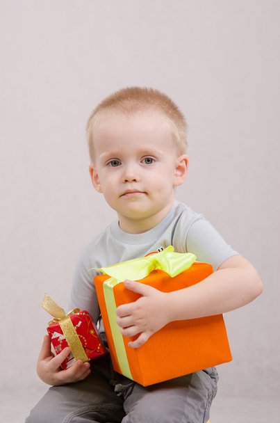 Year-old boy with gifts - Фото, изображение