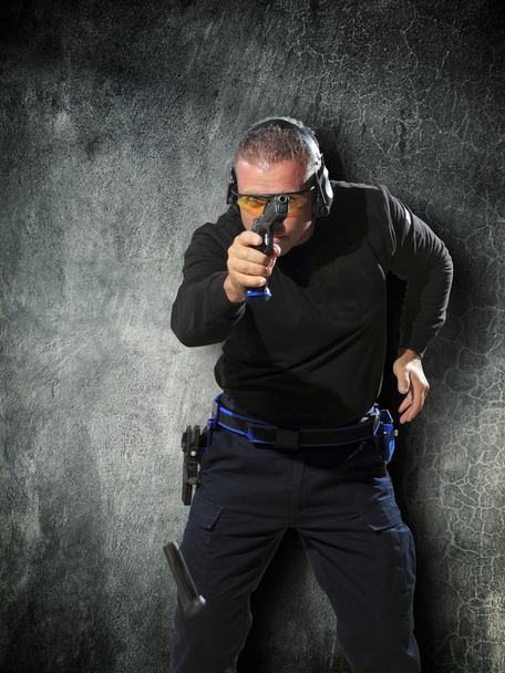 Man shooting gun - Fotó, kép