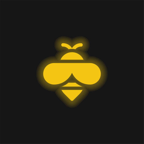 Abelha amarelo brilhante ícone de néon - Vetor, Imagem