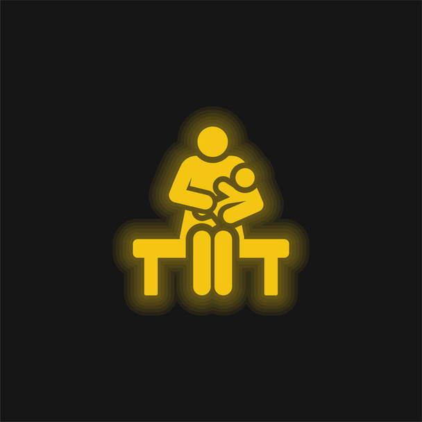 Breastfeeding yellow glowing neon icon - Vector, Image