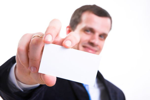 Man in suit with visiting card. Smile - Photo, image