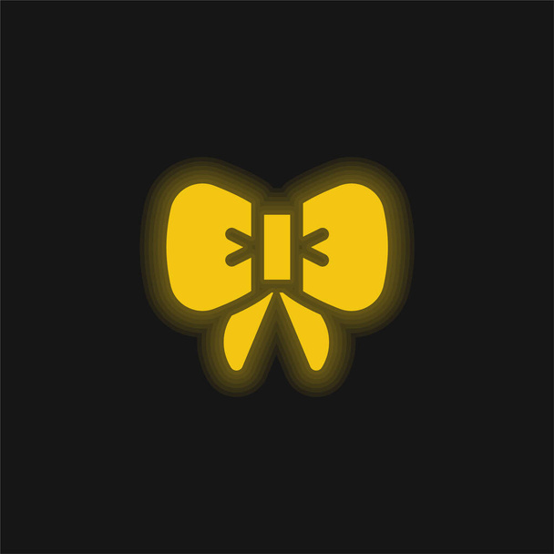 Pajarita amarilla brillante icono de neón - Vector, imagen