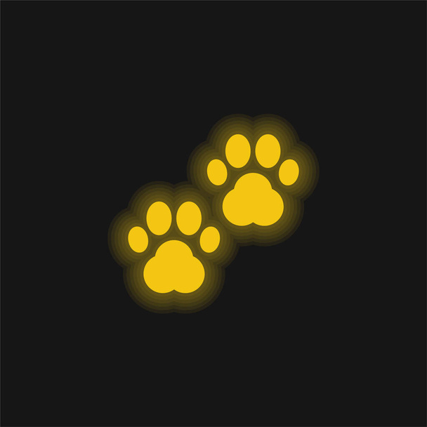 Animal Prints yellow glowing neon icon - Vector, Image