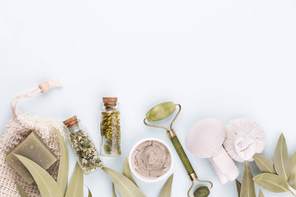 Spa and skin carehomemade cosmetics. Bottles with spa cosmetic products on pastel background. - 写真・画像