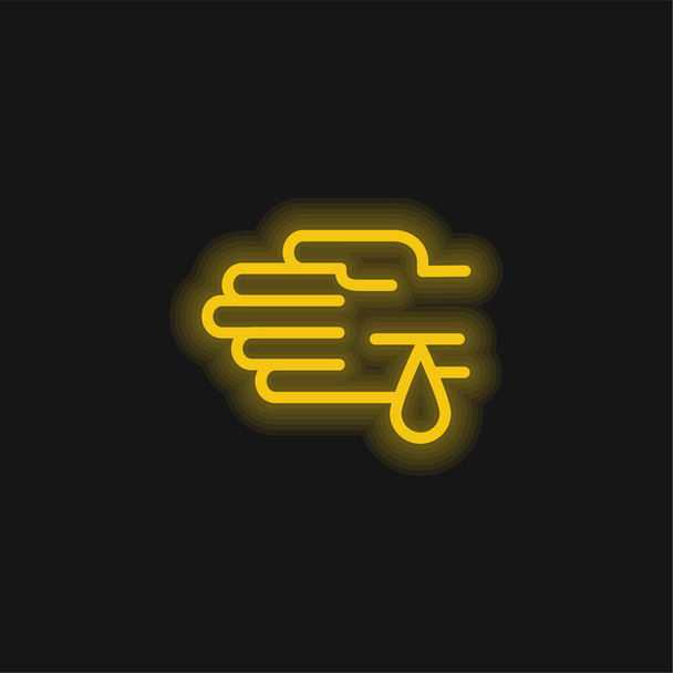 Bir elde kan damlası Yara sarı parlak neon ikon - Vektör, Görsel