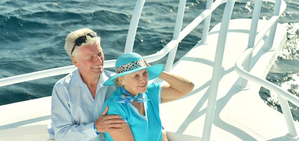 Senior couple having boat ride - Photo, Image