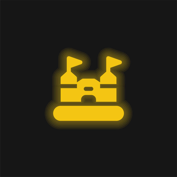 Castelo insuflável ícone de néon brilhante amarelo - Vetor, Imagem