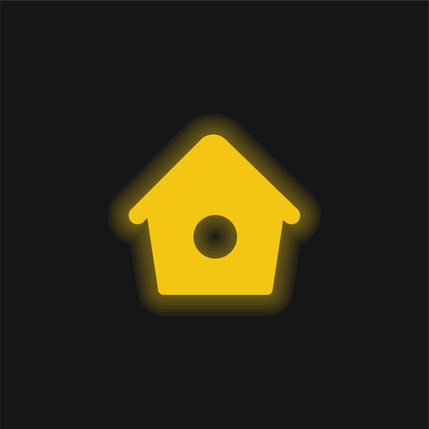 Pták domů s malou dírou žluté zářící neonové ikony - Vektor, obrázek